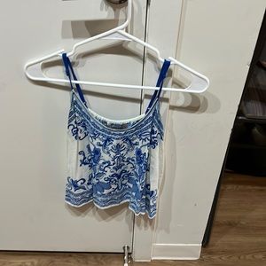 Adjustable strap flow tank top